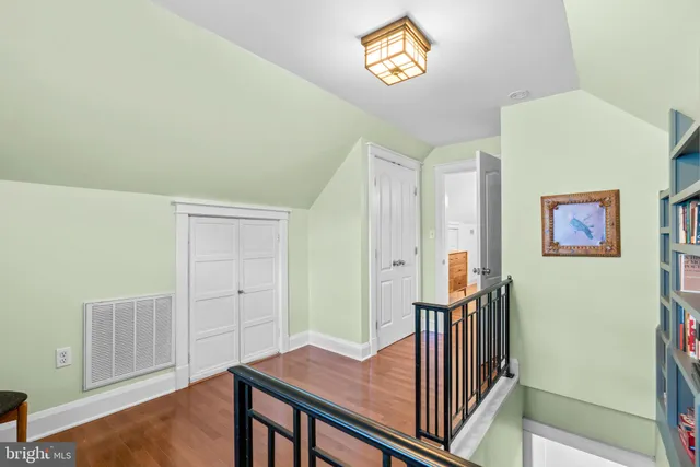 a view of a hallway with workspace