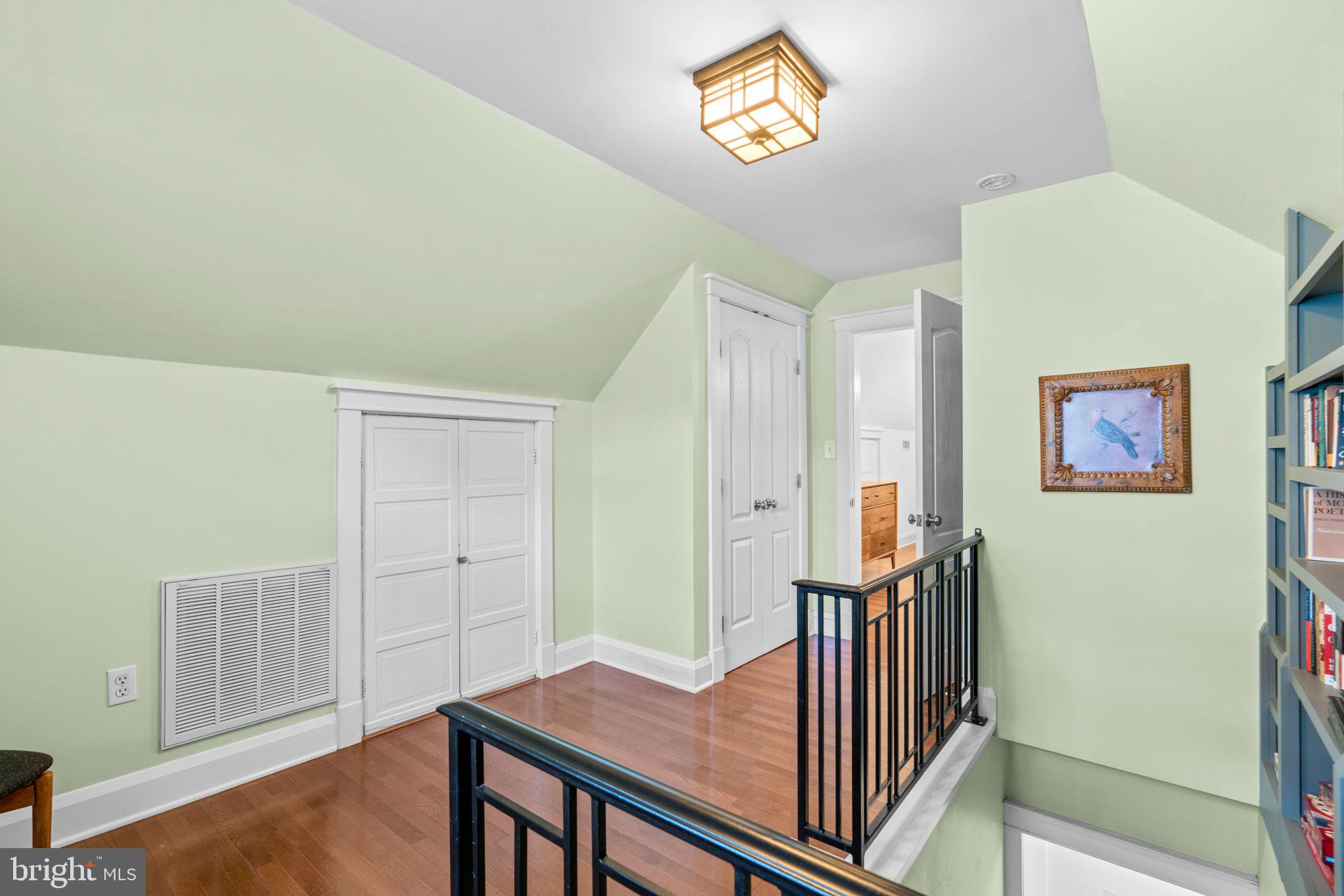 664 Regester Avenue Baltimore, MD 21212 - Photo 22 of 42 a view of a hallway with workspace