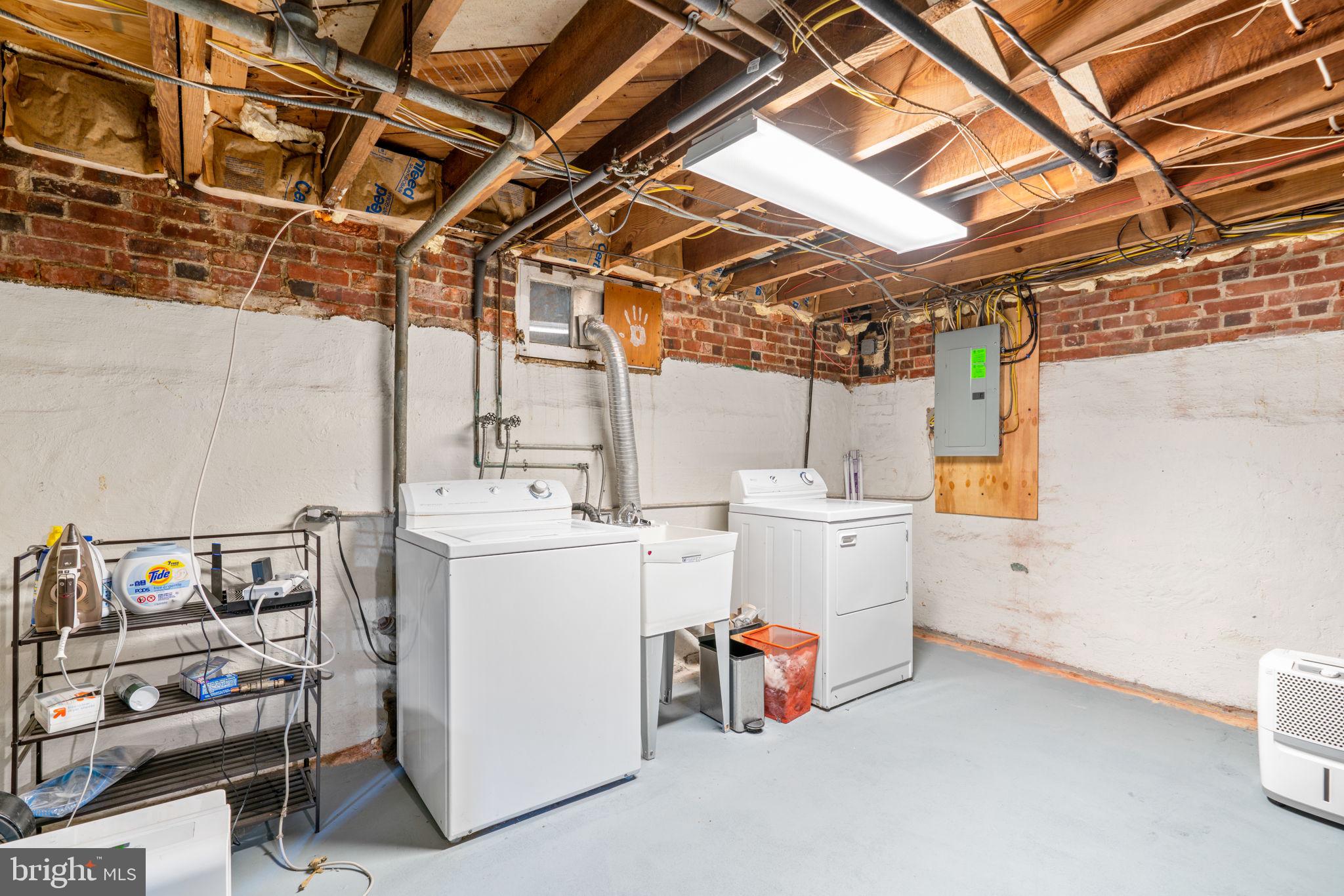 664 Regester Avenue Baltimore, MD 21212 - Photo 30 of 42 a utility room with dryer and washer
