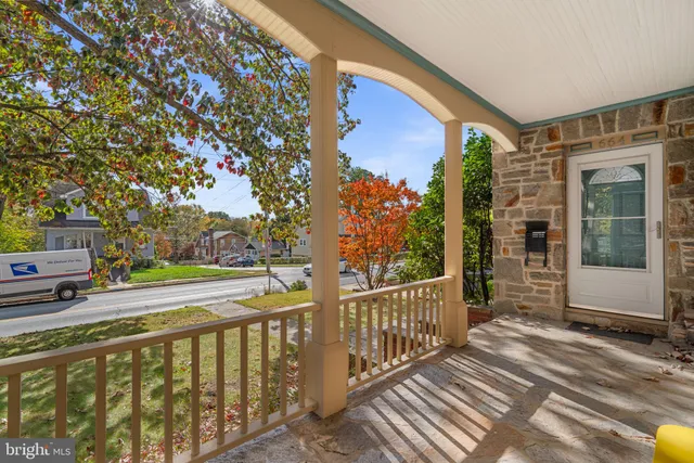a view of a balcony with city view