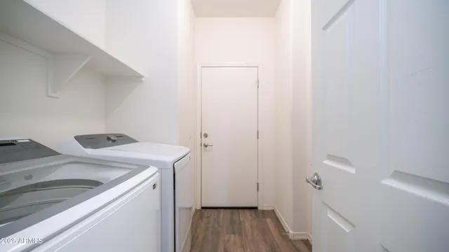 a utility room with dryer and washer