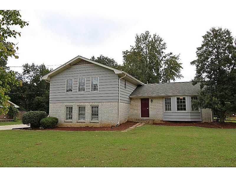 5154 Five Forks Trickum Road Southwest Lilburn, GA 30047 - Photo 1 of 1 Exterior Front. Move in ready in great location