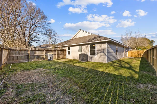 a view of a yard in front of house