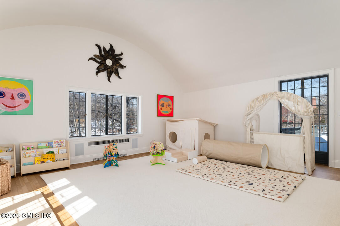 44 Khakum Wood Road Greenwich, CT 06831 - Photo 22 of 31 a living room with furniture and window