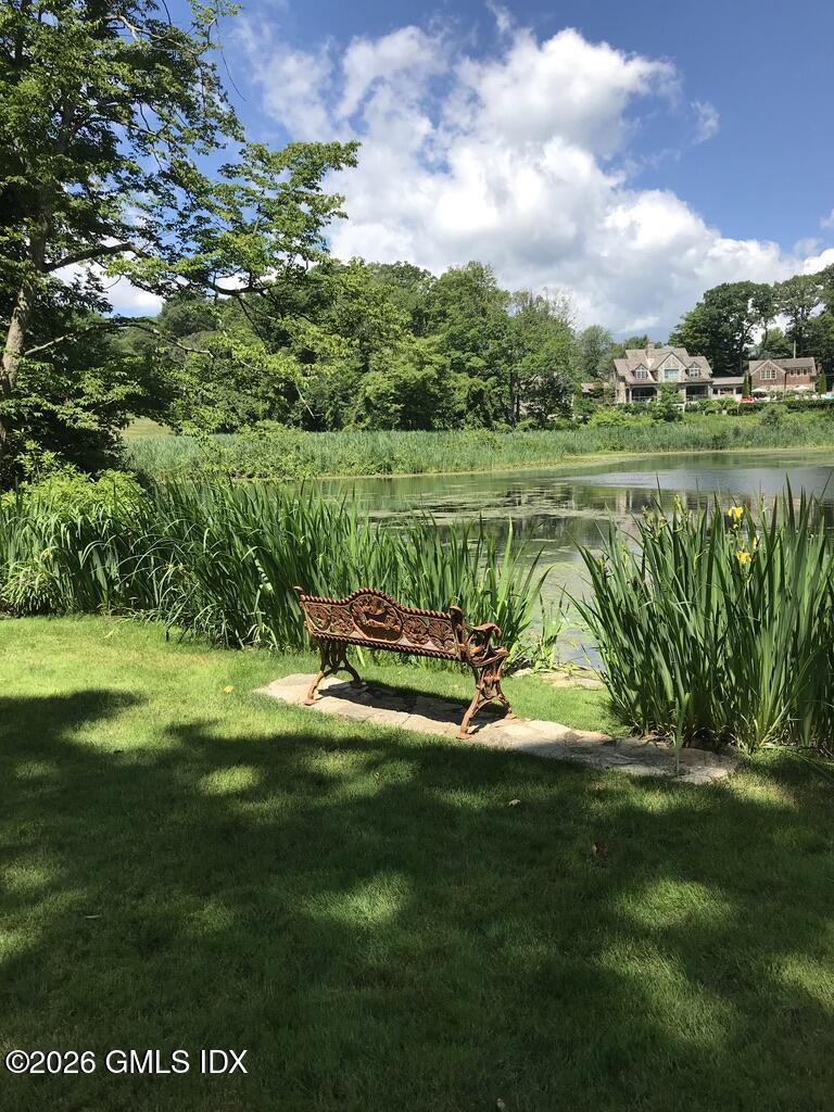 44 Khakum Wood Road Greenwich, CT 06831 - Photo 30 of 31 a view of a lake with a yard