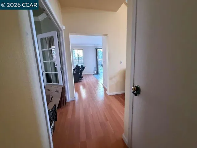 a kitchen with counter top space a sink and appliances