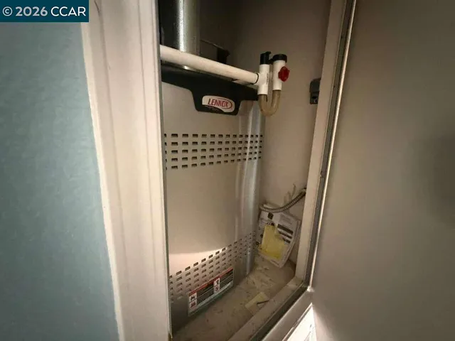 a view of a dining room with furniture and window