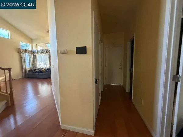 a bathroom with a tub a toilet and a shower