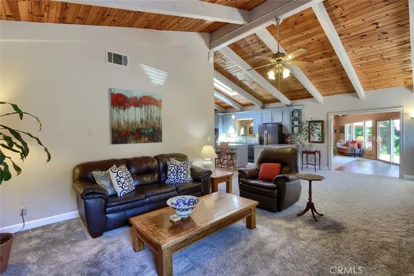 a kitchen with stainless steel appliances granite countertop a stove microwave and refrigerator