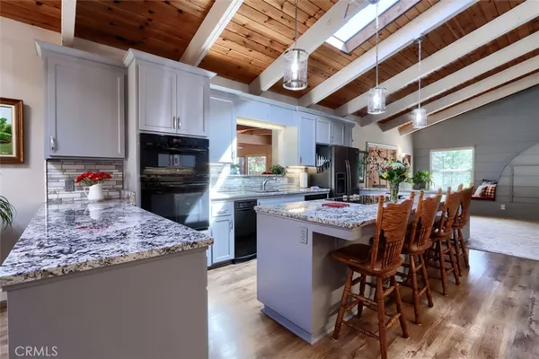 a bath tub sitting in a bathroom next to a sink