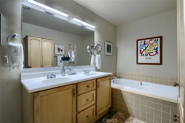 a bathroom with a glass door shower