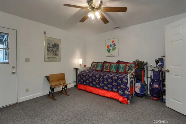 a view of a swimming pool with a yard