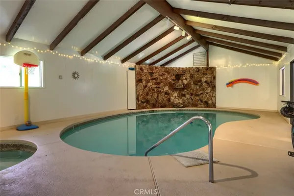 a view of balcony with outdoor seating and wooden floor