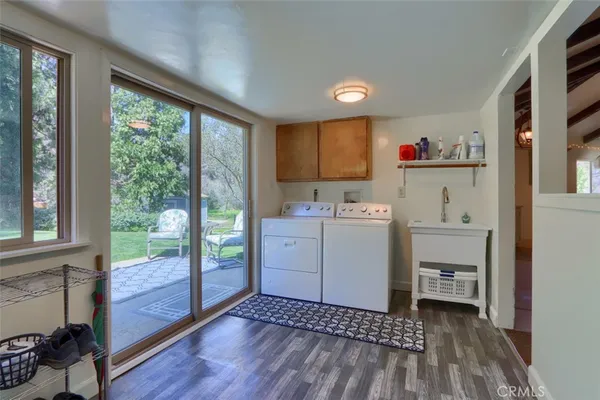 a front view of a house with a garden and porch