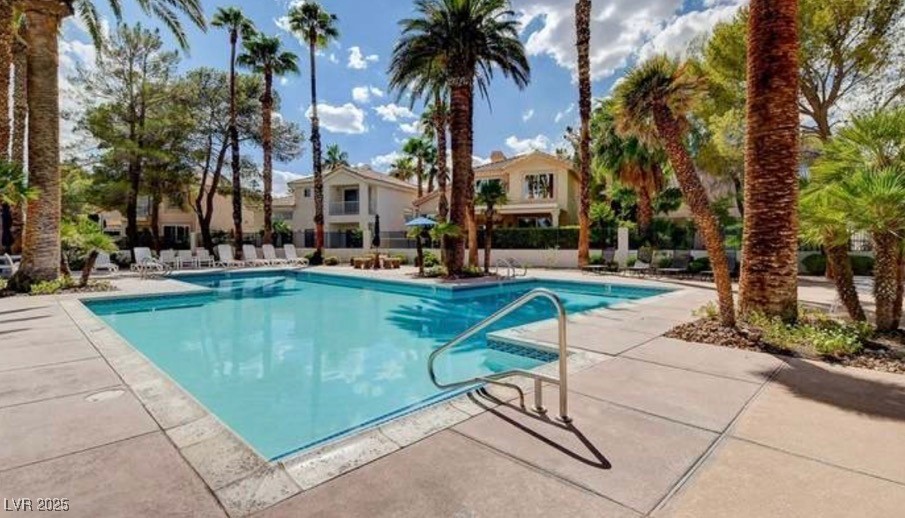 3151 North Soaring Gulls Drive, Unit 2211 Las Vegas, NV 89128 - Photo 19 of 20 Community pool with a patio