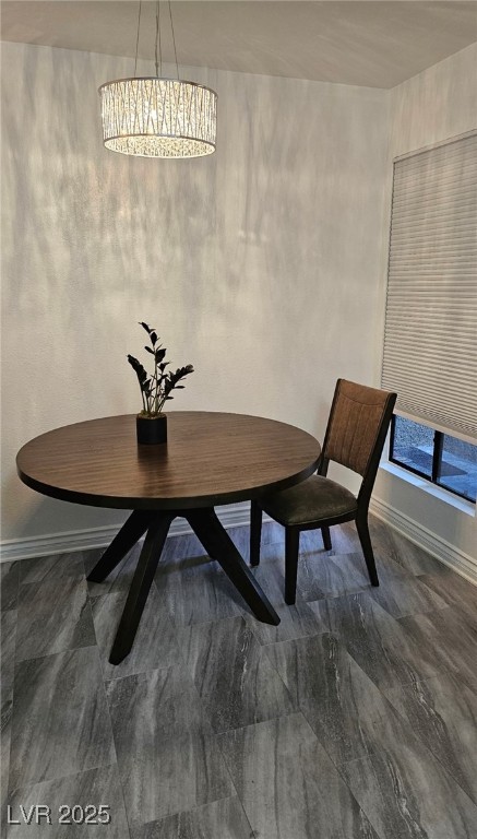 3151 North Soaring Gulls Drive, Unit 2211 Las Vegas, NV 89128 - Photo 7 of 20 Dining area featuring baseboards