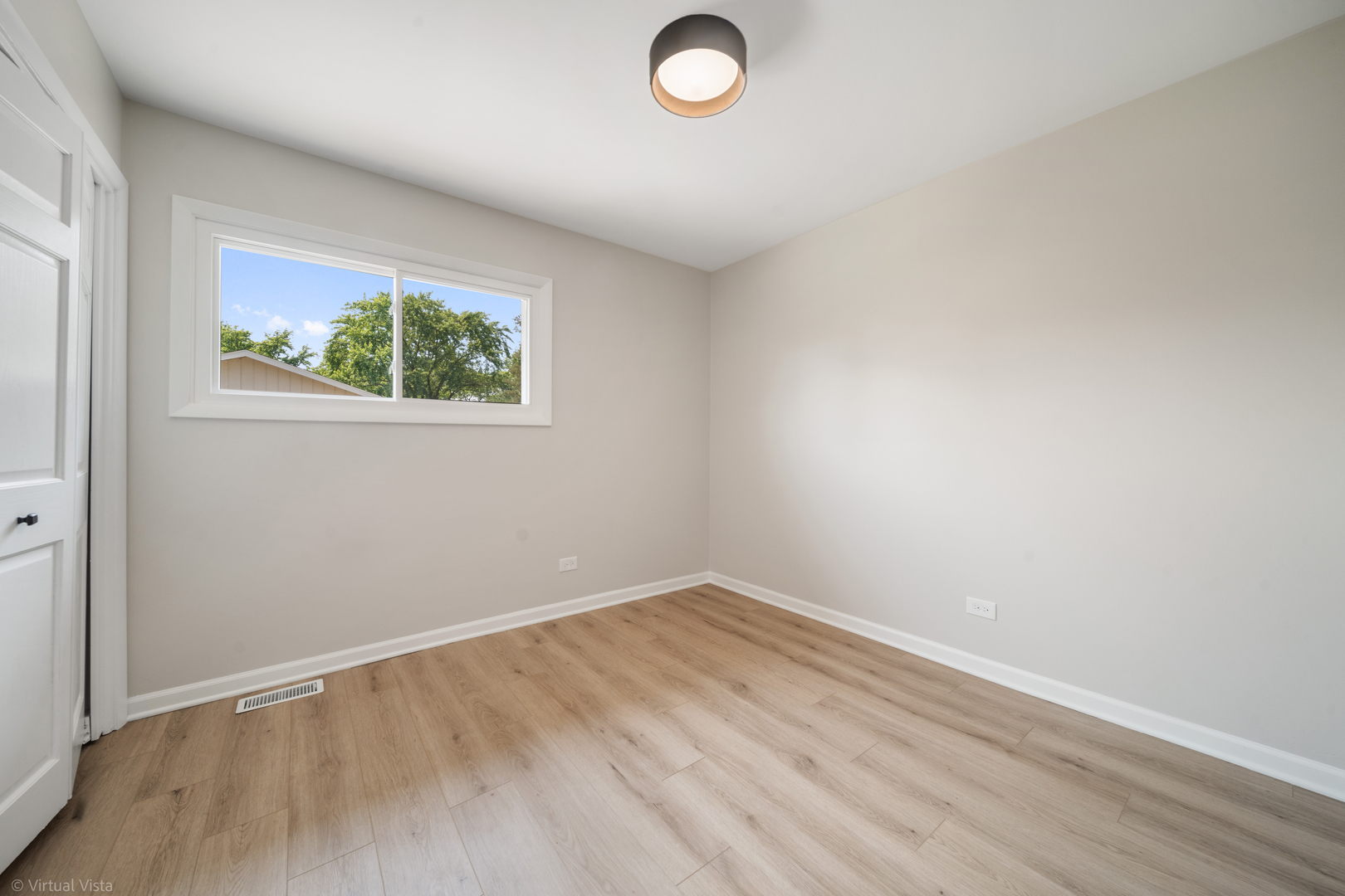 21-w040 Monticello Road Lombard, IL 60148 - Photo 17 of 33 an empty room with a window