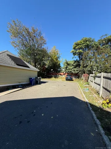 a view of swimming pool with a yard