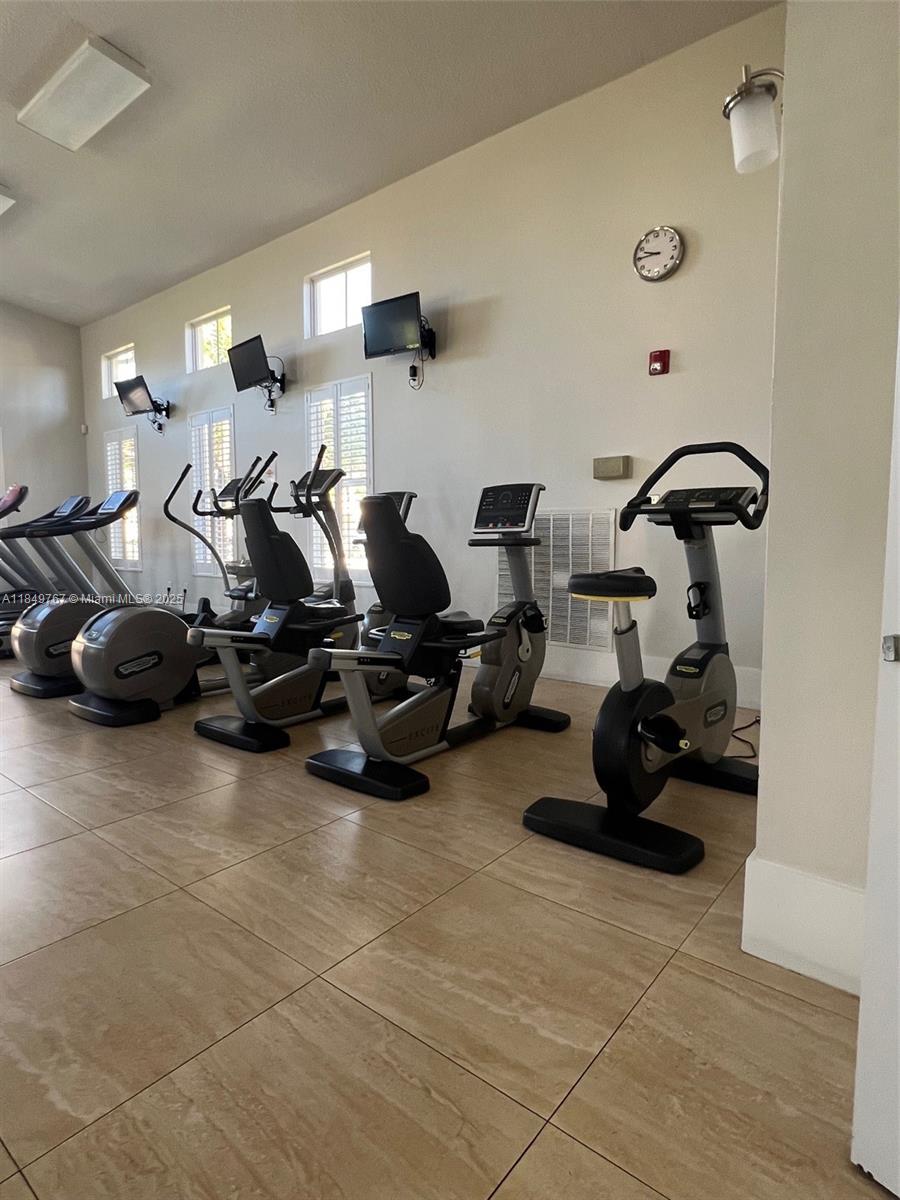 12724 Southwest 133rd Street Miami, FL 33186 - Photo 30 of 33 a view of a room with gym equipment