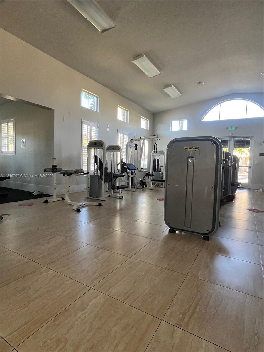 12724 Southwest 133rd Street Miami, FL 33186 - Photo 31 of 33 a lobby with furniture and lots of space