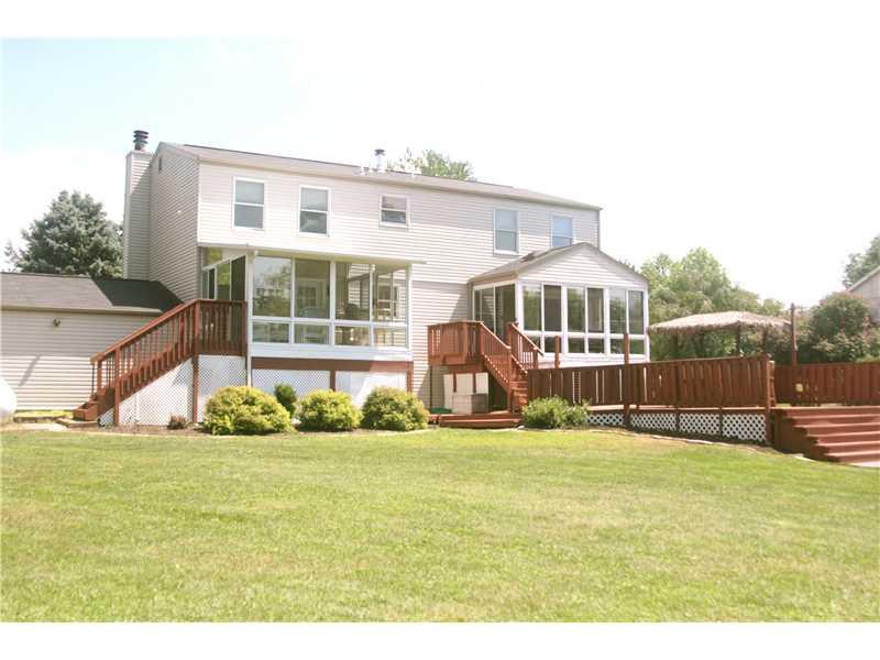224 Monks Road Valencia, PA 16059 - Photo 20 of 25 Exterior Back. Oversized deck enhances the outdoor living space.