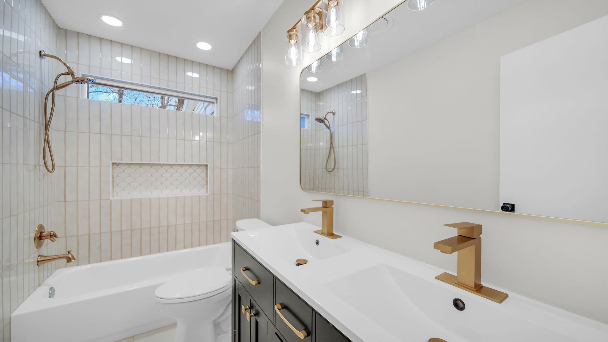 2800 Spring Hill Drive Memphis, TN 38127 - Photo 20 of 31 Full bathroom with double vanity, bathing tub / shower combination, and recessed lighting