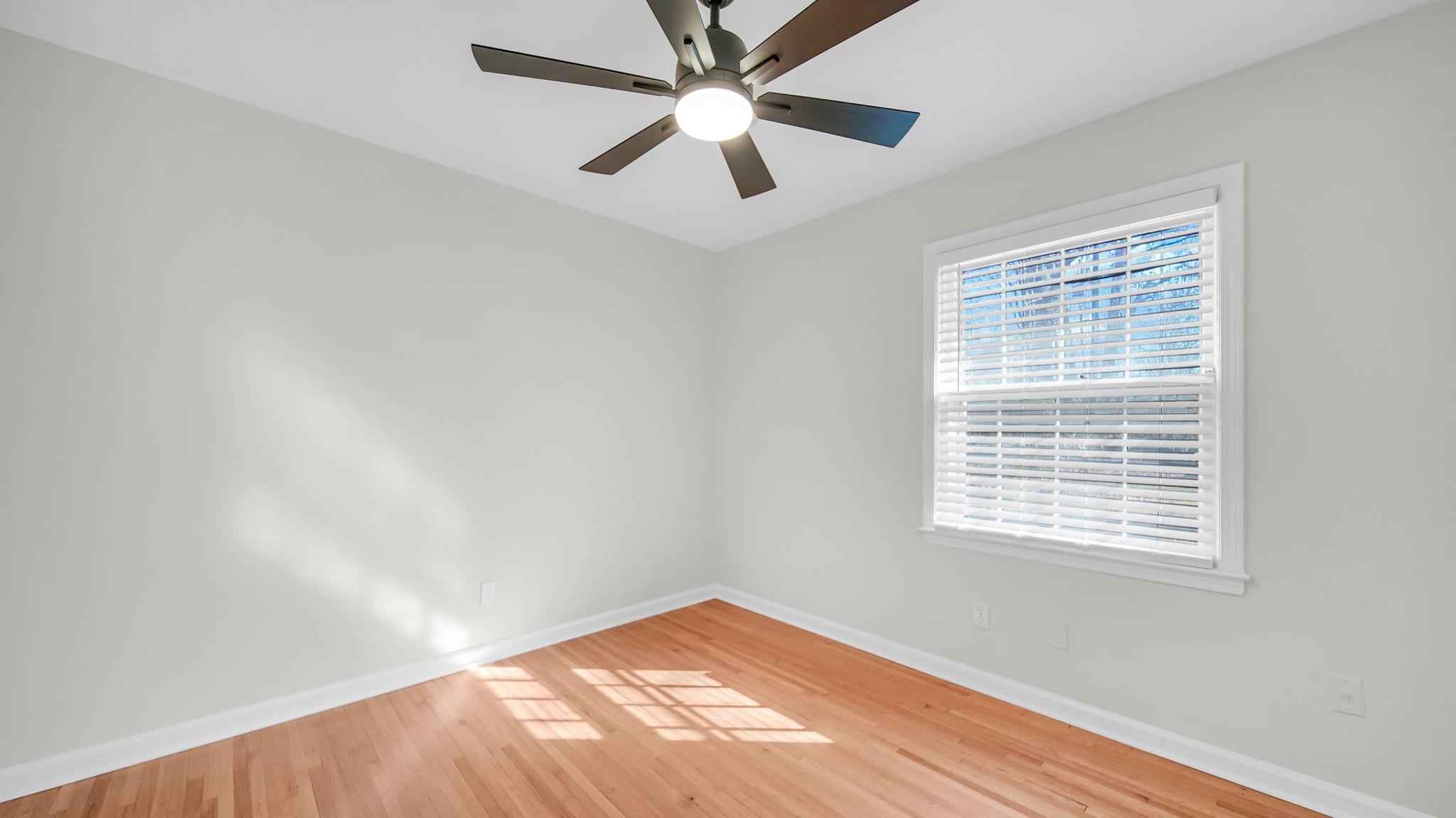 2800 Spring Hill Drive Memphis, TN 38127 - Photo 27 of 31 Spare room featuring light wood-type flooring and a ceiling fan