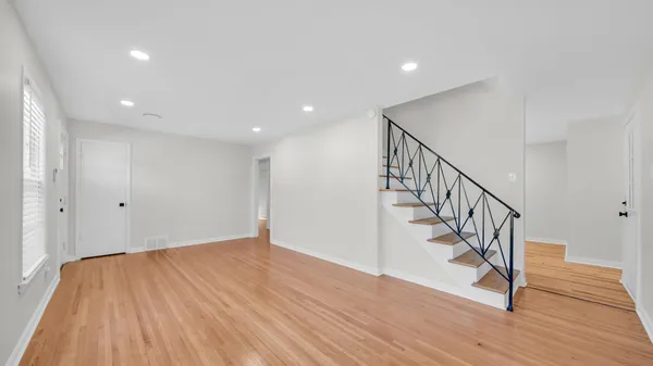 a view of entryway with wooden floor