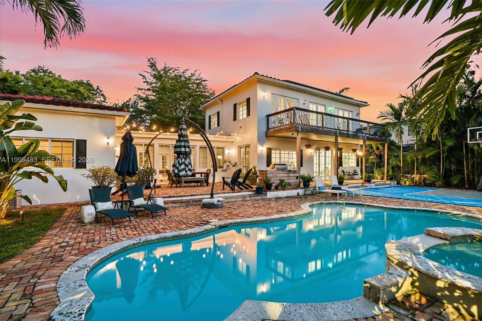 9636 Northeast 5th Avenue Road Miami Shores, FL 33138 - Photo 2 of 86 a view of a house with swimming pool