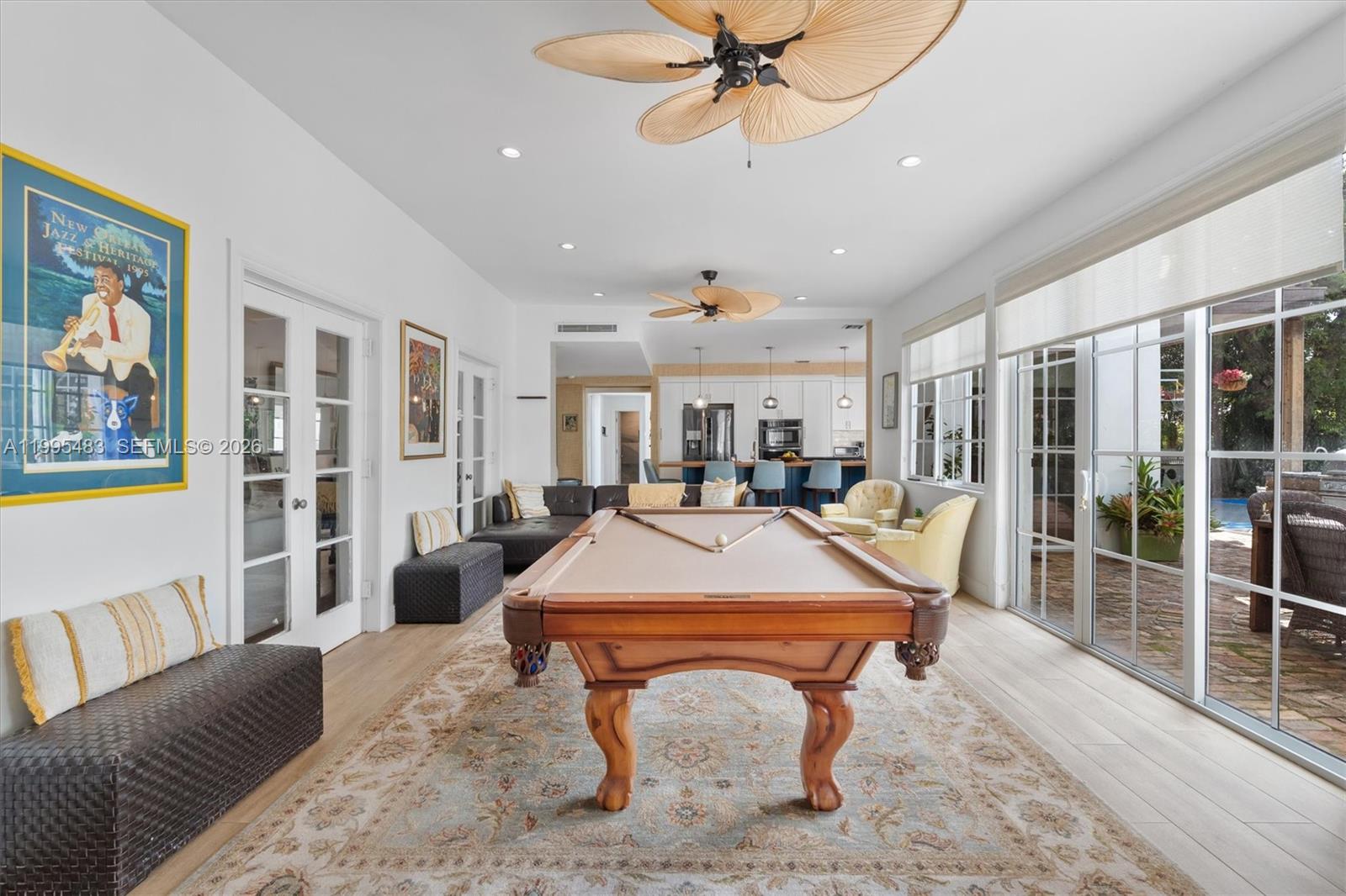 9636 Northeast 5th Avenue Road Miami Shores, FL 33138 - Photo 36 of 86 a room with furniture pool table and flat screen tv