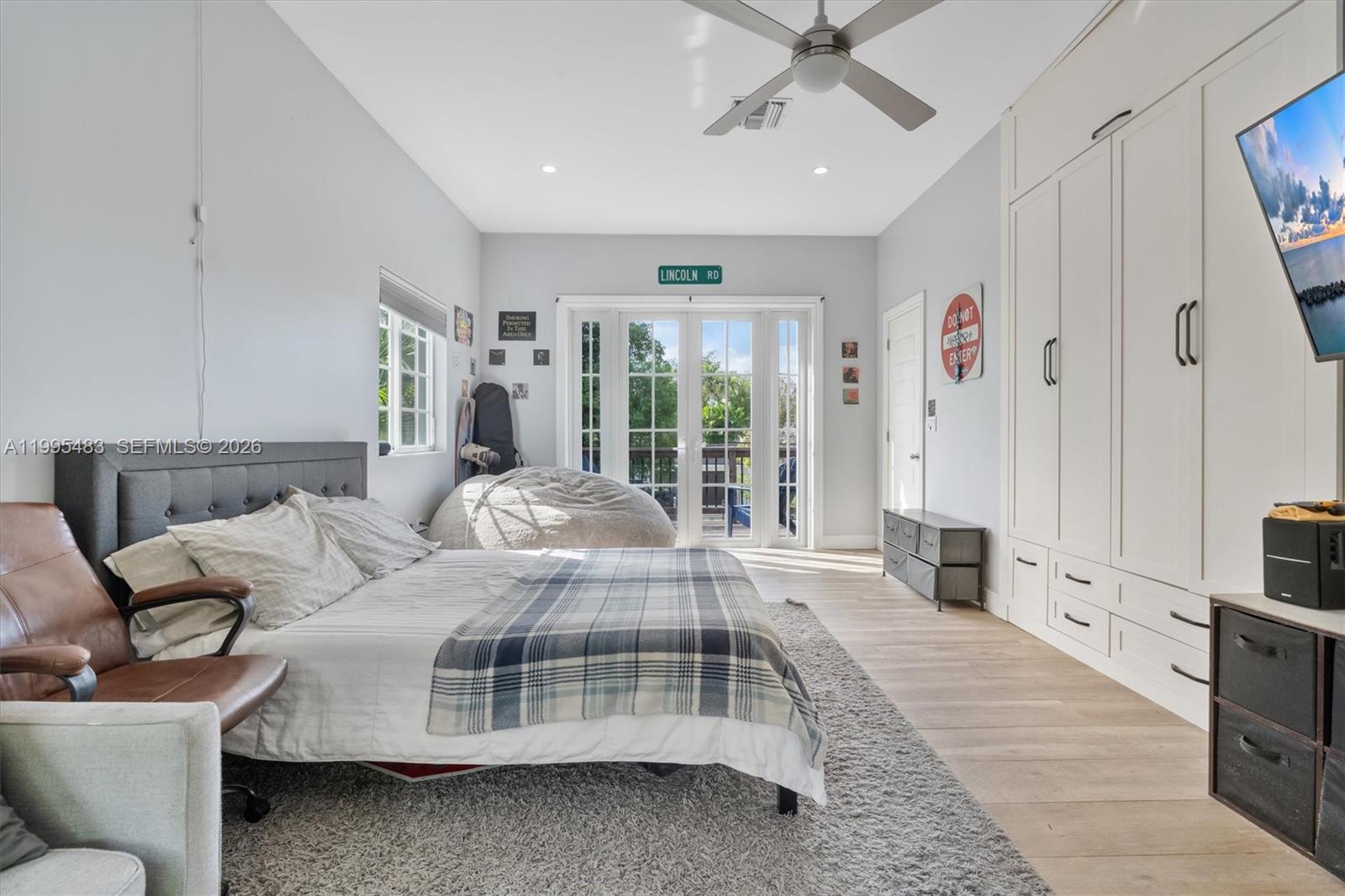 9636 Northeast 5th Avenue Road Miami Shores, FL 33138 - Photo 62 of 86 a living room with furniture and window