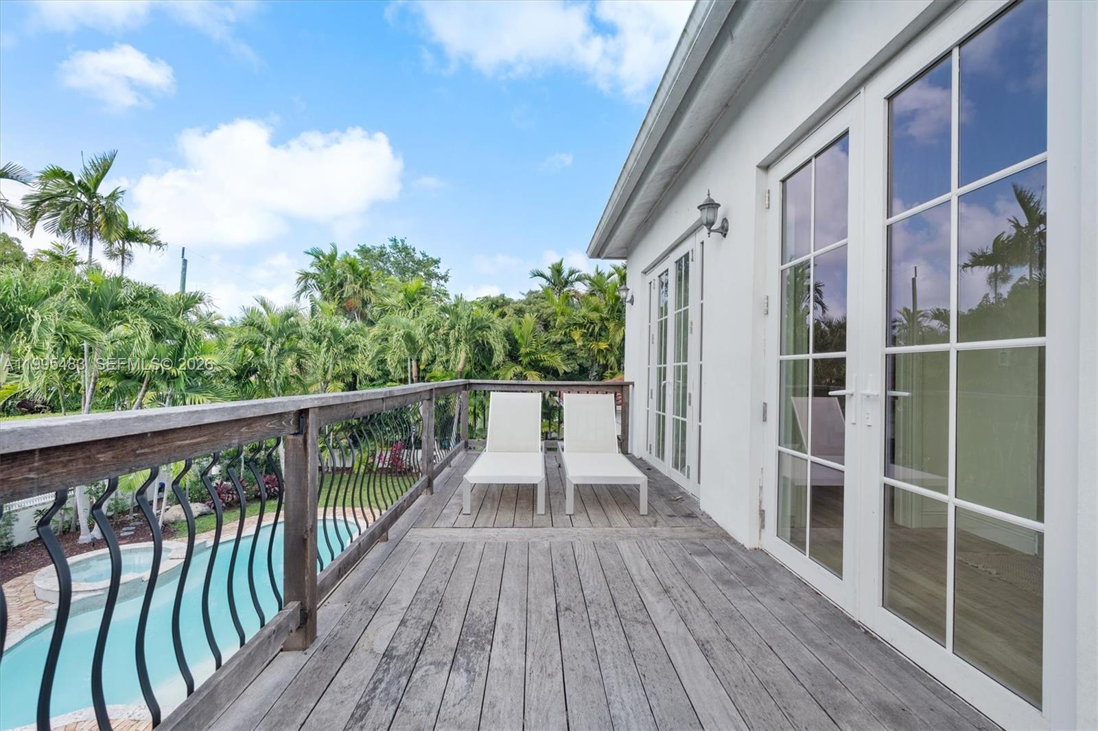 9636 Northeast 5th Avenue Road Miami Shores, FL 33138 - Photo 70 of 86 a view of balcony with wooden floor