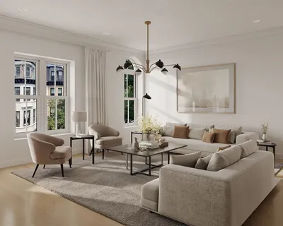 a living room with furniture and a window