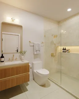 a bathroom with a sink toilet and shower