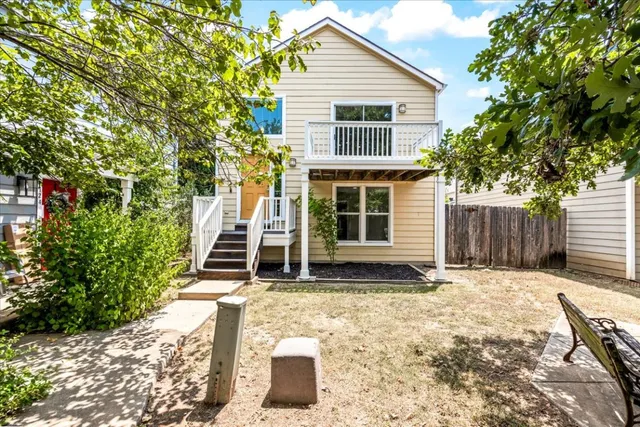 a house with trees in front of it
