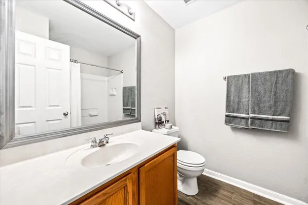 an aerial view of a house with outdoor space and street view