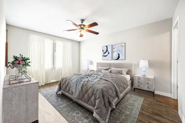 a view of an empty room and wooden floor