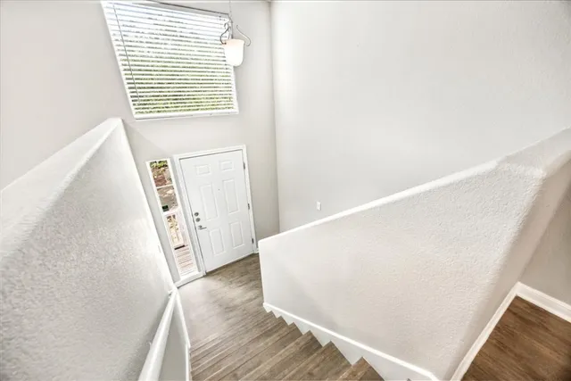 a kitchen with stainless steel appliances granite countertop a stove and a refrigerator