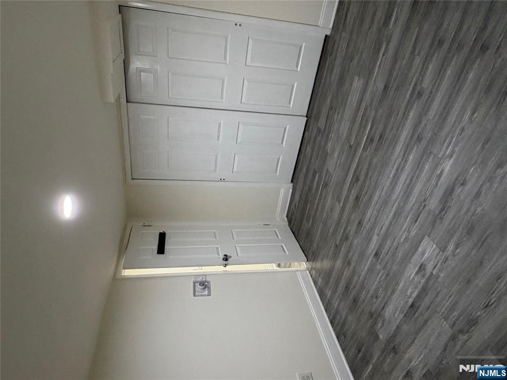 7810 3rd Avenue North Bergen, NJ 07047 - Photo 8 of 13 a view of a room with wooden floor