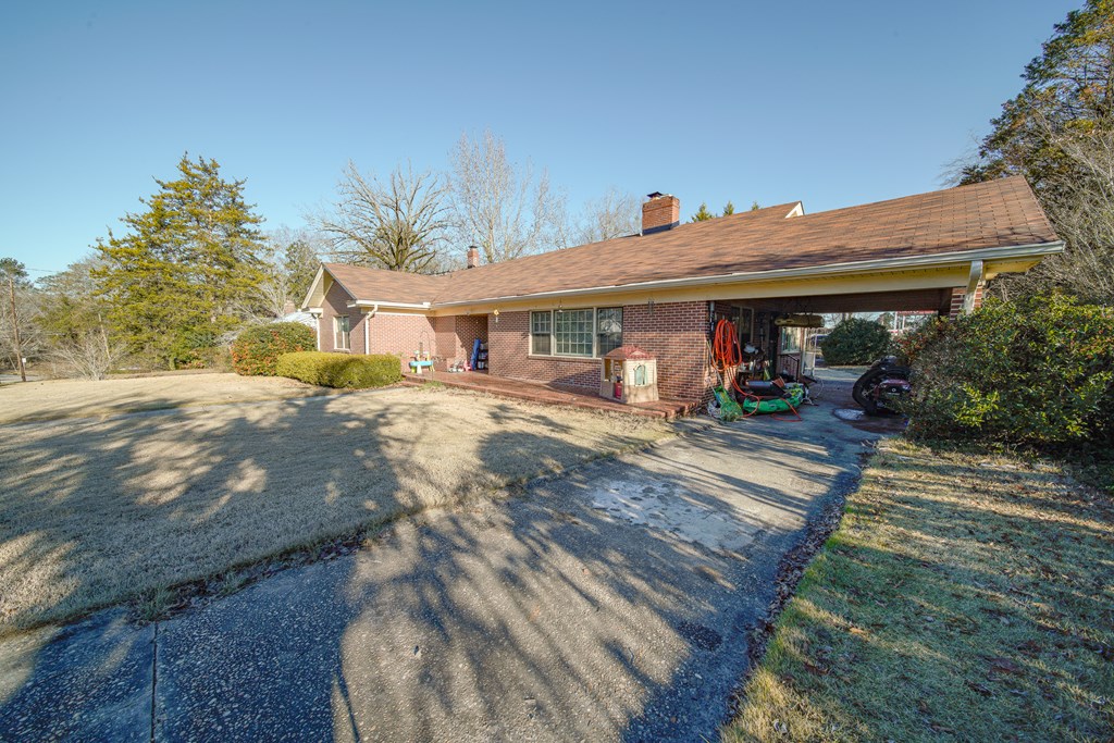 410 3rd Street Manchester, GA 31816 - Photo 12 of 45 a view of a house with backyard