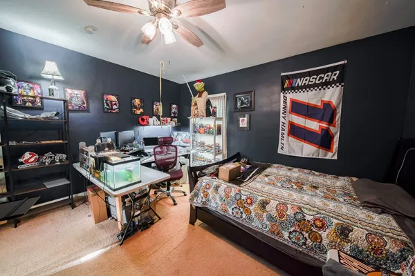 a view of a room with toys and wooden floor