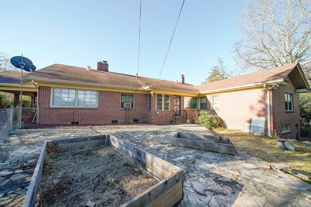 410 3rd Street Manchester, GA 31816 - Photo 3 of 45 a front view of a house with a yard