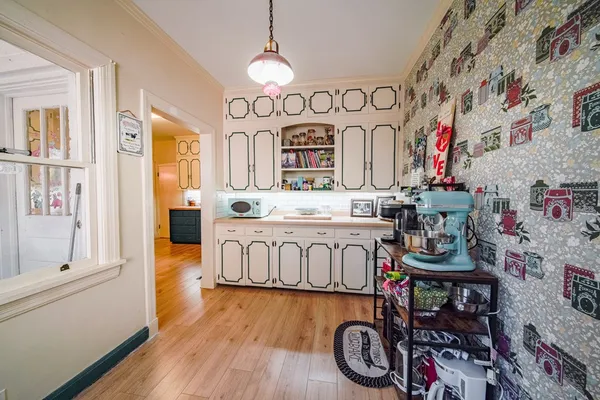 a kitchen with stainless steel appliances granite countertop a refrigerator and sink