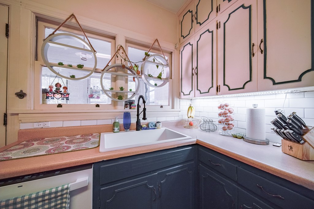 410 3rd Street Manchester, GA 31816 - Photo 34 of 45 a bathroom with a sink and a mirror