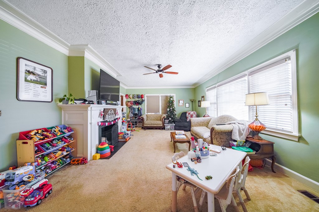 410 3rd Street Manchester, GA 31816 - Photo 40 of 45 a living room with furniture and a window