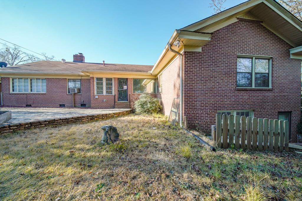 410 3rd Street Manchester, GA 31816 - Photo 5 of 45 a front view of a house with garden