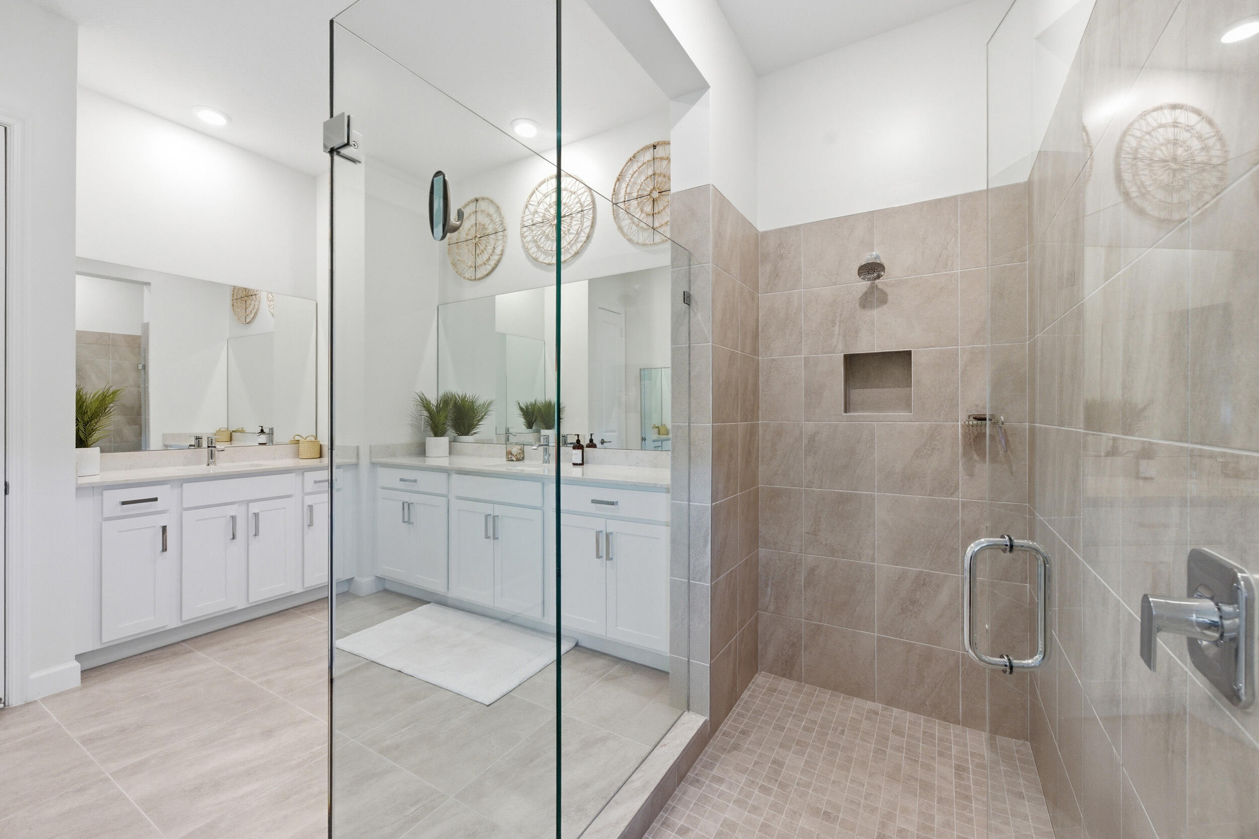 19230 Rolling Acres Road Loxahatchee, FL 33470 - Photo 28 of 58 a bathroom with a double vanity sink a mirror a window and a shower