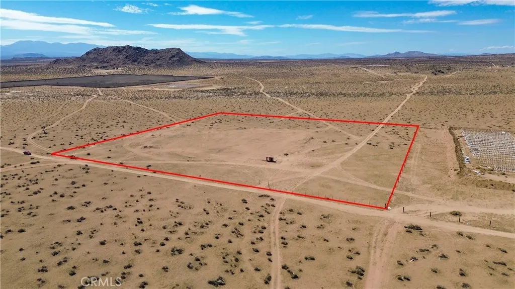 3 Adobe Mountain Road Adelanto, CA 92301 - Photo 7 of 14 a view of an ocean beach