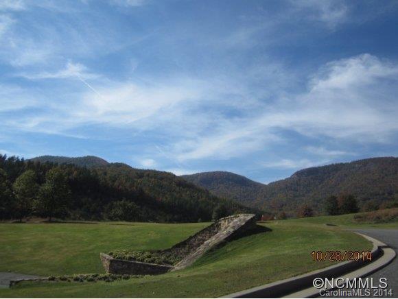 Lot 2104 Harm Creek Loop Mill Spring Mill Spring, NC 28756 - Photo 13 of 18 a view of a grassy field with mountains in the background