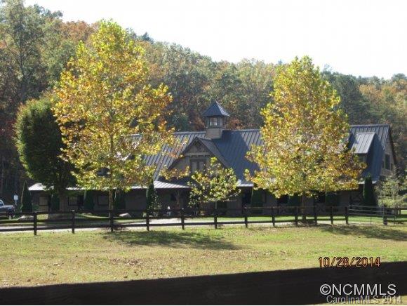 Lot 2104 Harm Creek Loop Mill Spring Mill Spring, NC 28756 - Photo 16 of 18 a view of a yard with a tree